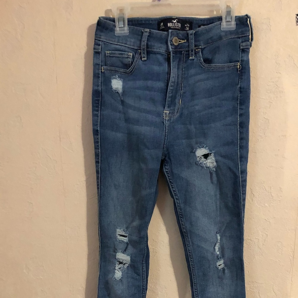 Distressed high rise jeans.
